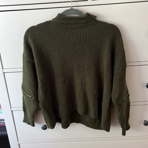 Boxy knit sweater with accent zippers on the sleeves and cutout detail. - Picture 2 of 6